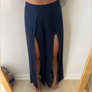 Navy blue pants with slit and shorts liner.